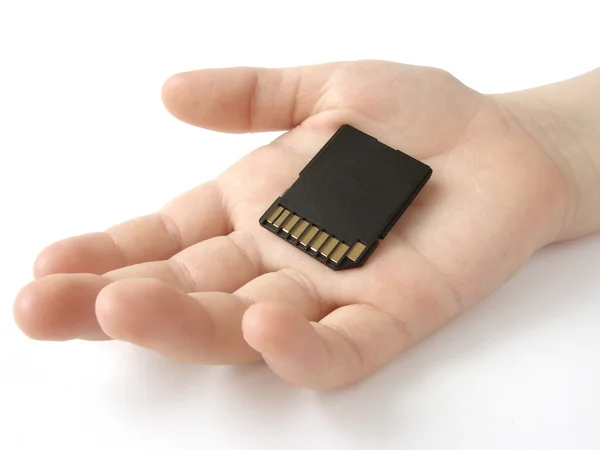 Hand with memory card — Stock Photo, Image