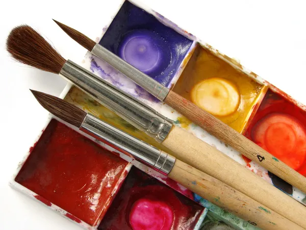 Tintas com escovas — Fotografia de Stock