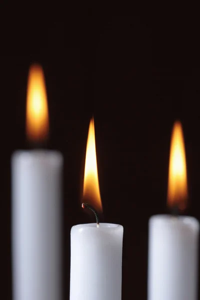Três velas acesas — Fotografia de Stock