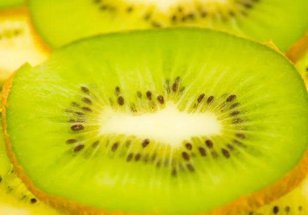 stock image Kiwi slices, background, macro