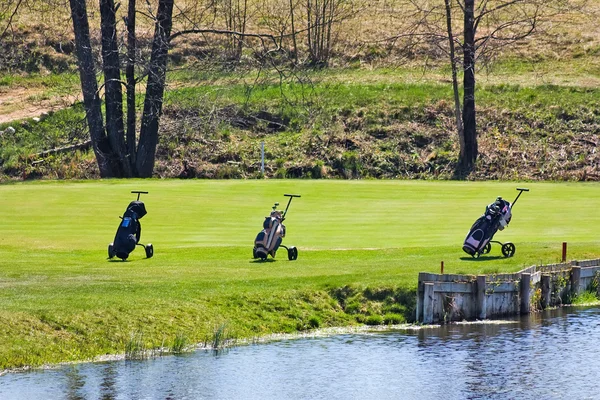 Tre golfbilar — Stockfoto