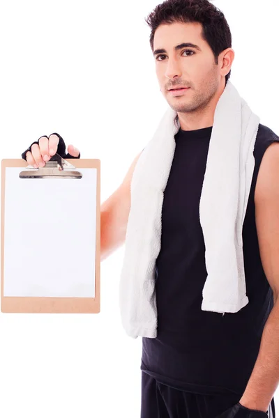 Fitness Man mostrando uma placa em branco — Fotografia de Stock