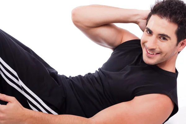 Homem fazendo exercício abdominal — Fotografia de Stock