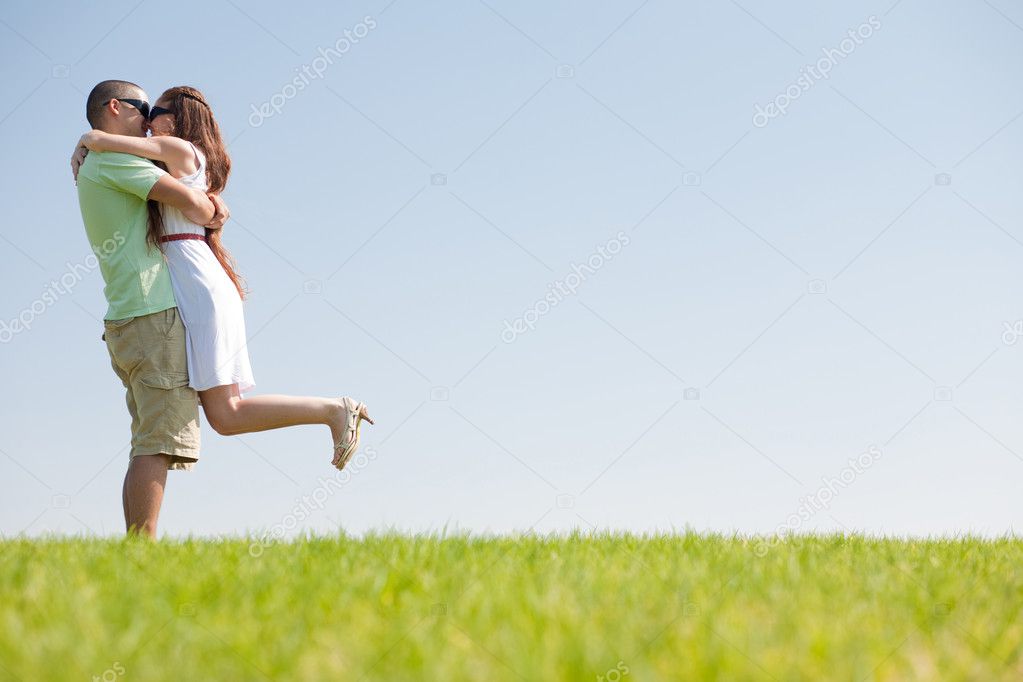 Young Couple fooling on the park