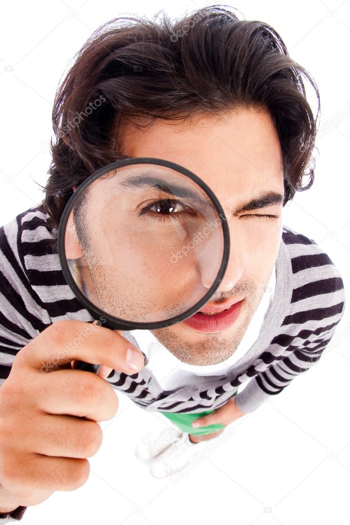Man looking with magnifying glass