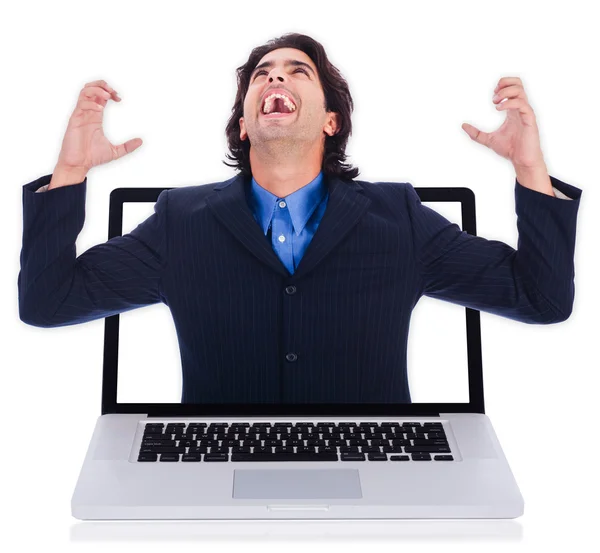 Człowiek biznesu, obejmując za pośrednictwem laptopa — Zdjęcie stockowe