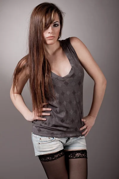 Young fashion model with a long hair — Stock Photo, Image