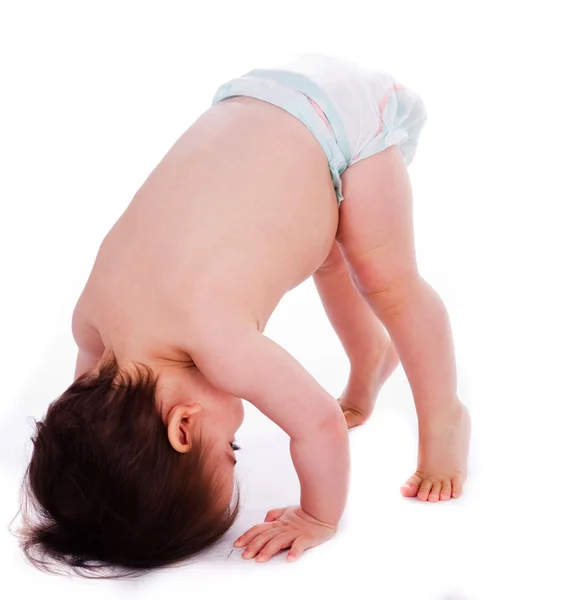 Baby bending down frontwards — Stock Photo, Image