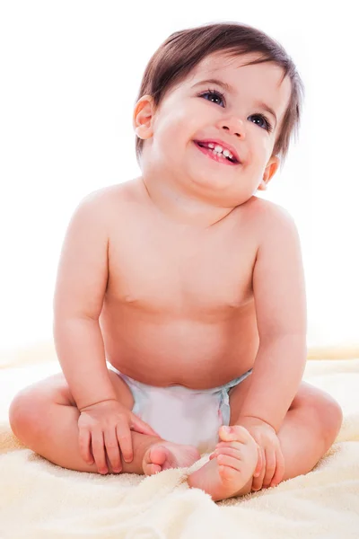 Bebê sentado e sorrindo — Fotografia de Stock