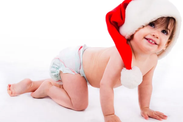 サンタ帽とクロールの赤ちゃん — ストック写真