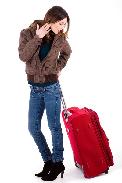 Frau mit ihrem Koffer — Stockfoto