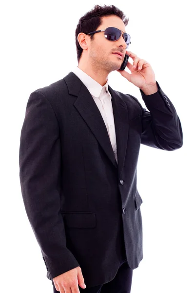 Jovem homem de negócios falando por telefone — Fotografia de Stock