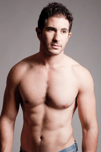 Fit man showing chest — Stock Photo, Image