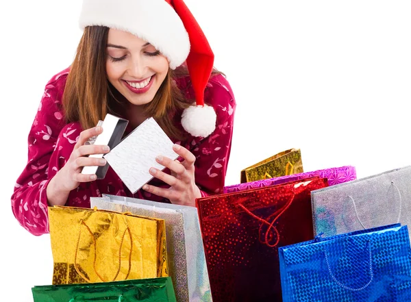 Santa menina abrindo a caixa de presente — Fotografia de Stock