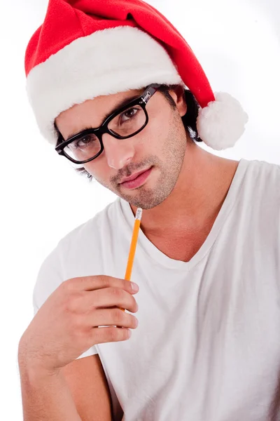 Handsome man thinking by wearing santa — Stock Photo, Image