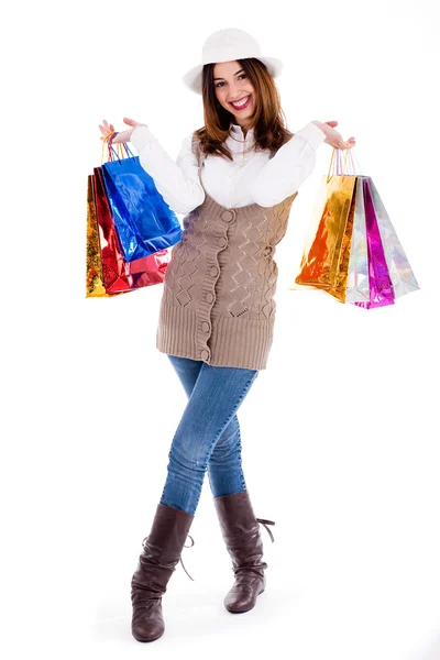 Fiatal lány sok bevásárló táskák — Stock Fotó