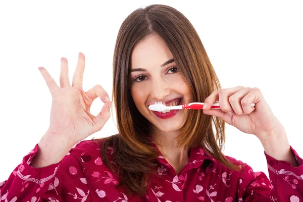 stock image Women brushing her teeth