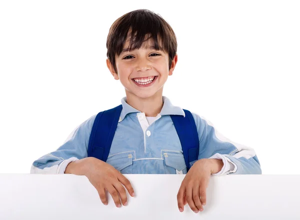 Smiling boy behind the blank board — Zdjęcie stockowe