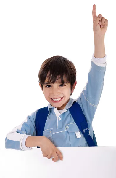 Základní škola kluk zvedl ruku — Stock fotografie