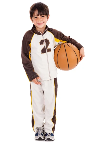 Niño en su vestido deportivo con pelota — Foto de Stock