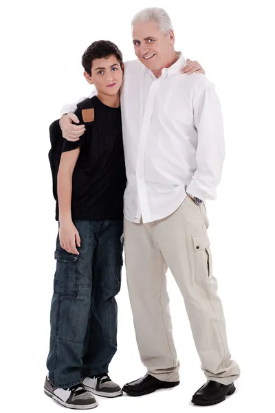 Отец обнимает своего сына — стоковое фото