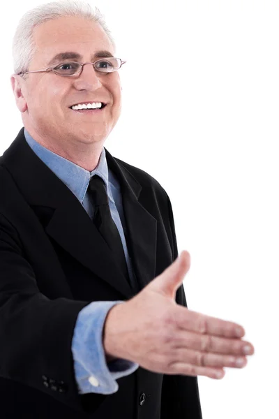 Senior business man håller ut sin hand — Stockfoto