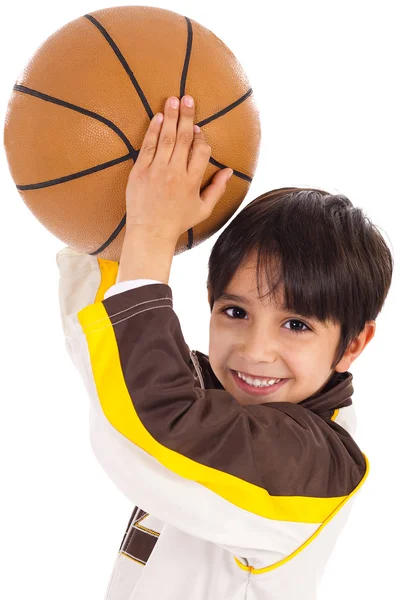 Little kid while throwing the ball Royalty Free Stock Photos