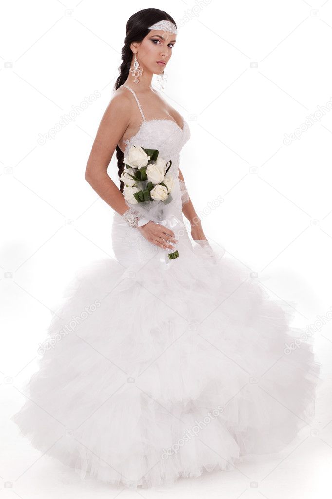 Isolated young trendy bride with bouquet