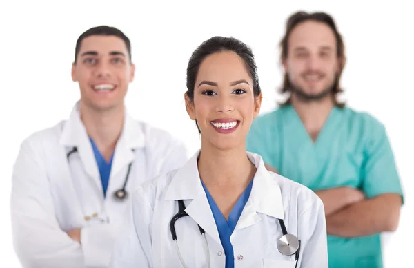 Etniska läkare med kollegor — Stockfoto