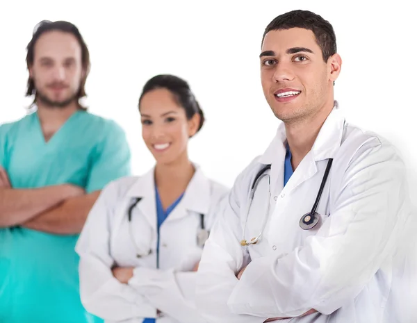 Grupp läkare som ler mot kameran — Stockfoto