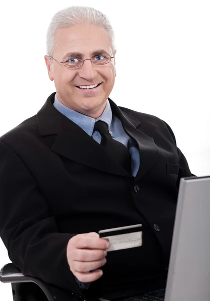 Homem sênior fazendo compra online — Fotografia de Stock