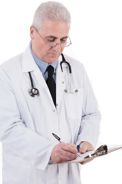 Médico sénior a escrever relatórios — Fotografia de Stock