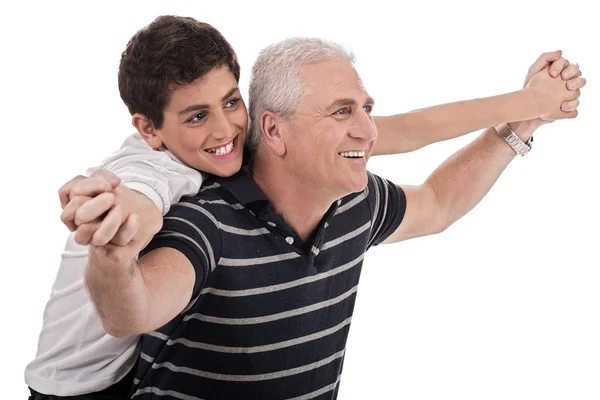 Piggyback ride given by grandfather — Stock Photo, Image