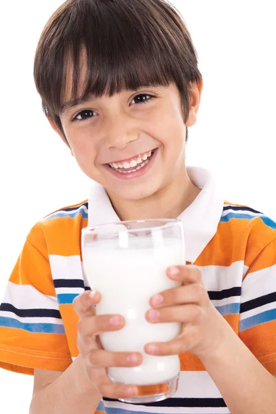 Happy kid holding a glass of milk — Stock Photo, Image