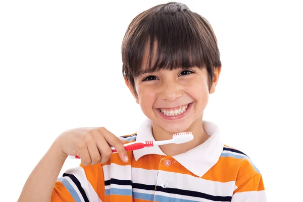 Närbild av söta unge borsta hans tänder — Stockfoto
