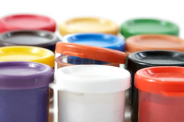 Jars with a paint gouache on white back — Stock Photo, Image