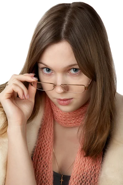 The girl in fur coat and glasses on a w — Stock Photo, Image