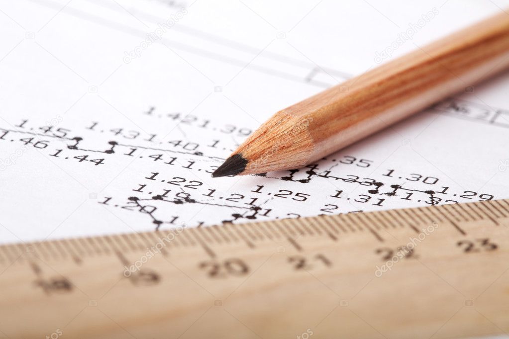 Wooden ruler and pencil