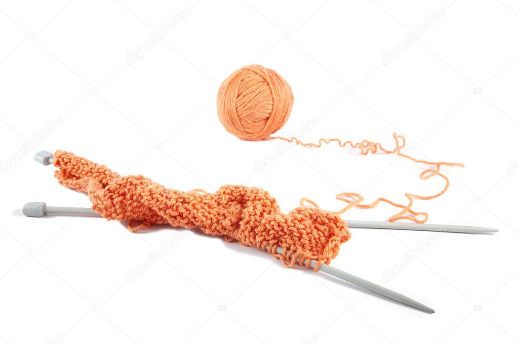 Knitting spokes with ball of wool