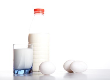 Bottle glass of milk and an egg clipart
