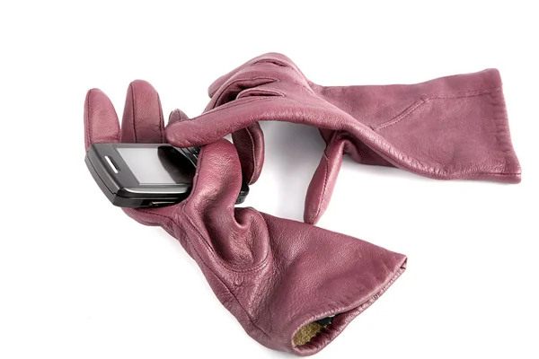 Handskar komprimera mobiltelefon — Stockfoto