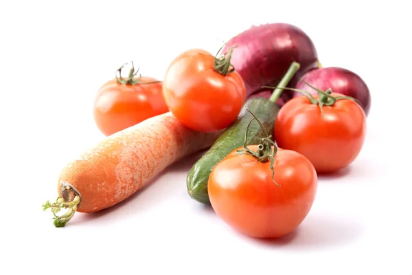 Tomates de pepino e uma cebola — Fotografia de Stock
