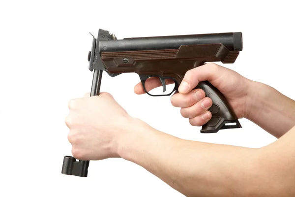 Człowiek w ręce pistolet pneumatyczny — Zdjęcie stockowe