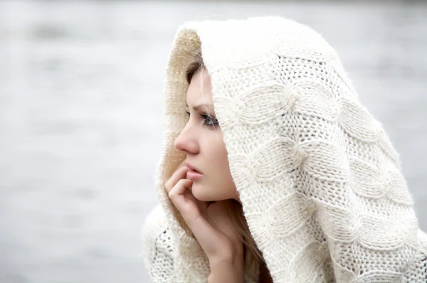 The thoughtful girl in knitted dress — Stock Photo, Image