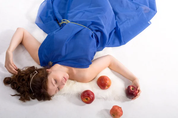 Lying lady with apples — Stock Photo, Image
