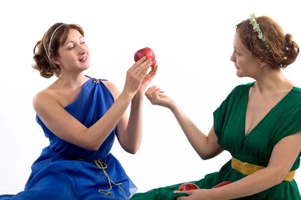 Two ladies and apples — Stock Photo, Image