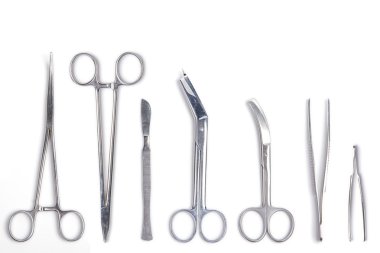 Surgeon tools - scalpel, forceps, clamps clipart