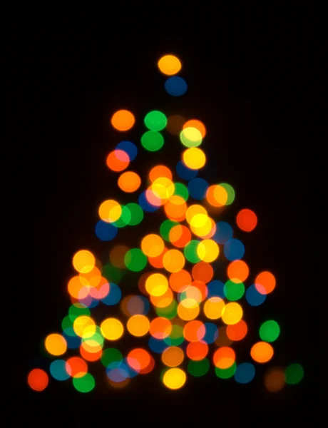 Bont kerstboom vormige intreepupil terug — Stockfoto