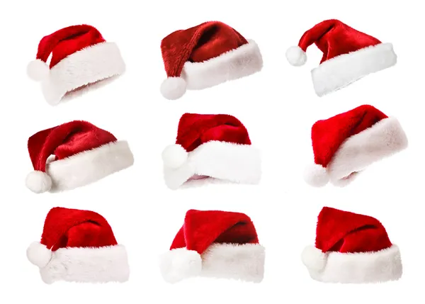Set von Weihnachtsmützen isoliert auf weiß — Stockfoto