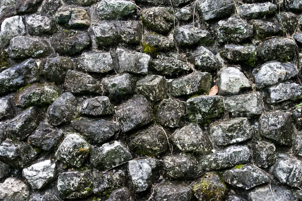 Текстура древней каменной стены — стоковое фото